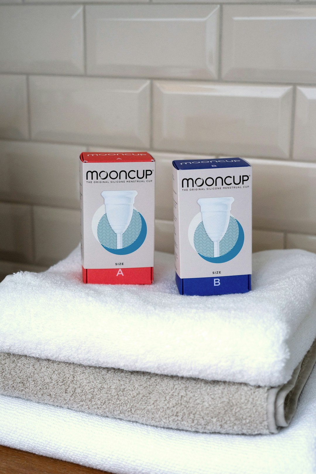 white-and-blue-box-on-white-towel-lztm68jpwis
